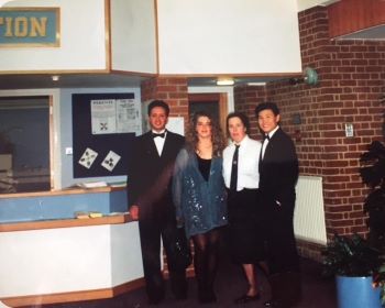Rita Pickett with three students in York House reception area