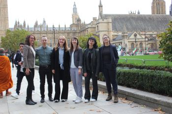 The Sussex 4 Day Week research team outside the Houses of Parliament