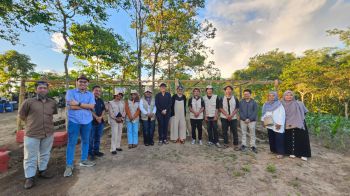 Members of the LEAF Indonesia team and students from Universitas Negeri Gorontalo pose for a photo at the Living Lab