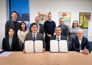 Group shot of all participants involved with the Business School signing with MoU, National Assembly of Korea