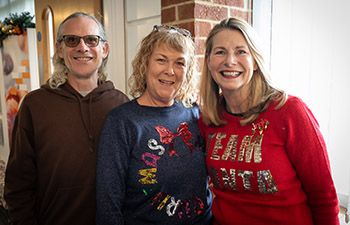 Three attendees at Suss-Ex Christmas Party 2025