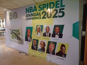 A large conference promo banner shows headshots of the key speakers, including Professor Stephen Shute
