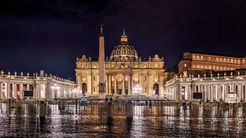 A picture of St Peter's Basilica in the evening