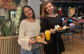 A photo of students enjoying comedy night in Eat Central