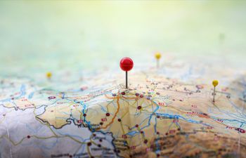 globe marked with pin