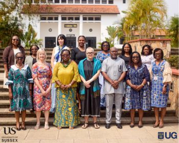 Sussex delegation with their University of Ghana colleagues - group of 20 people (mostly women) in colourful clothing