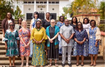 Sussex delegation with their University of Ghana colleagues - group of 20 people (mostly women) in colourful clothing