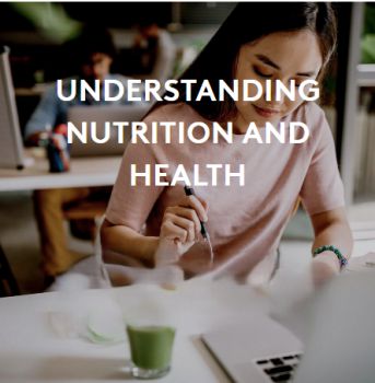 Head and shoulder picture of a person with a health drink and plate of food