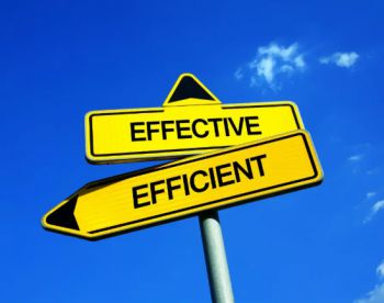 Two signs, one saying 'Effective' and the other saying 'Efficient'