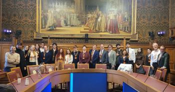group of students and MPs at Houses of Parliament