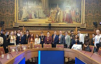group of students and MPs at Houses of Parliament