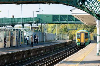 Train arriving to Falmer station on a sunny day