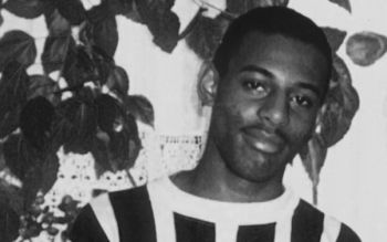 Black and white photograph of Stephen Lawrence as a young man.