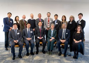 group of academics stood for group photo
