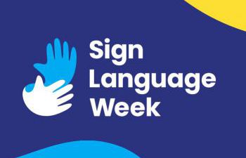 Sign language week logo, white and blue hands on a nave background with light blue and yellow corners