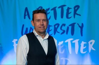 Photo of Peter Newell during awards ceremony at the University of Sussex