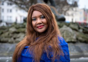 A portrait photo of Dr Tam Cane