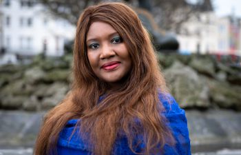 A portrait photo of Dr Tam Cane