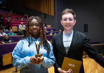 Student receives prize for their competition entry