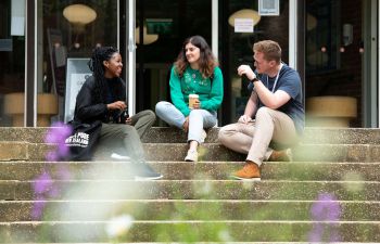 Students sitting on steps