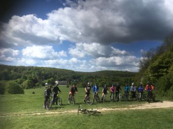 mountain bikers on a hill