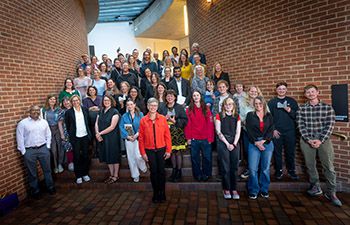 Staff Awards 2026 winners on the stairs of the Attenborough Centre for the Creative Arts