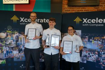 Matthew Cruse photographed along with other chefs with their awards