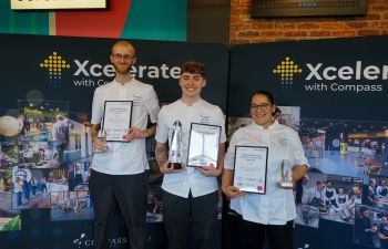 Matthew Cruse photographed along with other chefs with their awards