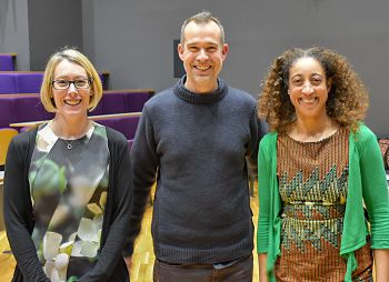 Chris van Tulleken (centre) pictured smiling with BSMS's Claire Smith (left) and Chi Eziefula (right) in a campus lecture theatre