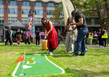 Photo of students enjoying garden games on Bramber House lawns