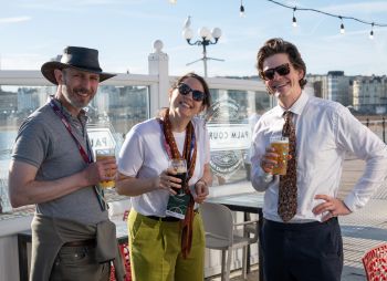 Visitors enjoy the May sunshine on Brighton Pier