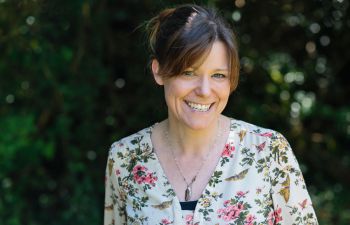 A professionally taken portrait photograph of Lucy Owen-Collins, founder and MD of Bee in the Woods kindergarten schools