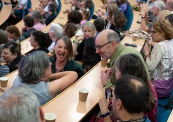 90s reunion alum in a lecture theatre