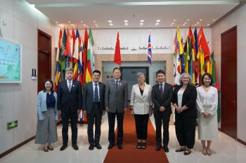 Group photo of Sussex delegates meeting UIBE hosts in Beijing