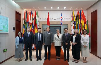 Group photo of Sussex delegates meeting UIBE hosts in Beijing