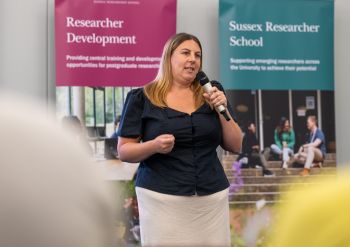Natalia James presenting their research at the 2026 3MT competition