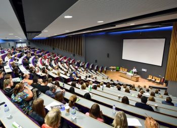 Jubilee Lecture Theatre audience listening to a speaker at front of room