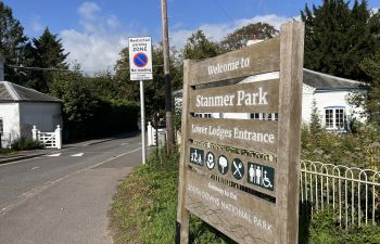 A photo of the entrance sign to Stanmer Park