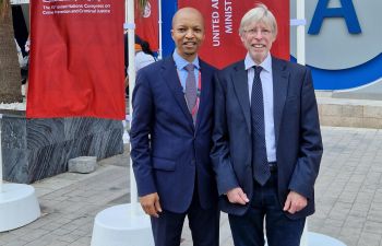 Prof Shute with Lunga Benghu outside the Congress venue.