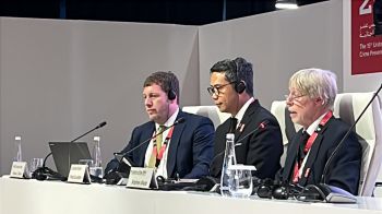 Prof Shute is shown with 2 other panel members as he presents at the Congress in Abu Dhabi.