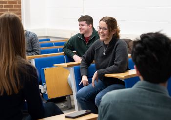 Students laughing and talking at a Placements event
