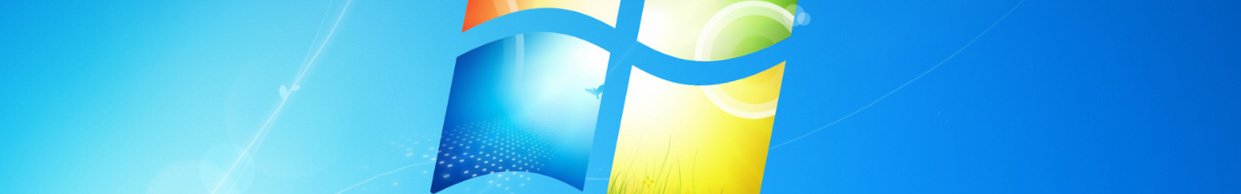 Windows 7 desktop showing IE9 open on the staff homepage and Wordpad windows