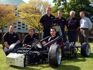 Raring to go. Formula Student team with Dr Dave Hole and Professor Richard Stobart