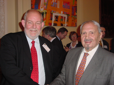 Naim Dangoor, right, with the then Education Secretary Charles Clarke at the scholarships launch