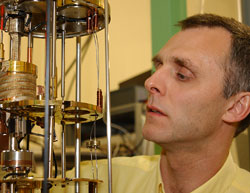 Particle physicist Professor Philip Harris monitors an experiment at Sussex