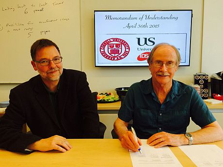 Justin Rosenberg and Phil McMichael at the signing of the MoU, April 2015