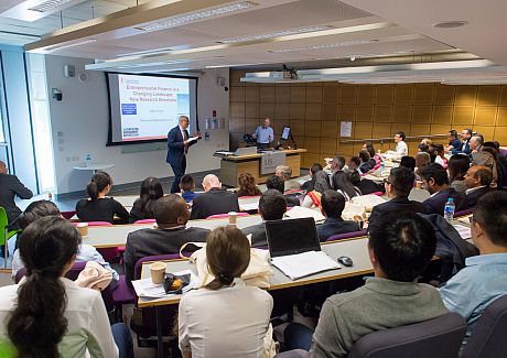 Ranko Jelic and Mike Wright address the 2018 Young Finance Scholars conference