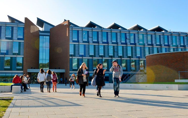 Students walking in front of Jubilee Building