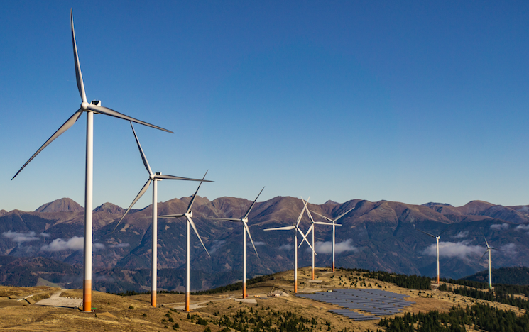 A wind and solar farm in the mountains