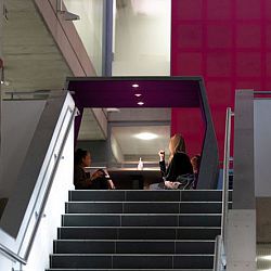 students sit in jubilee study pods